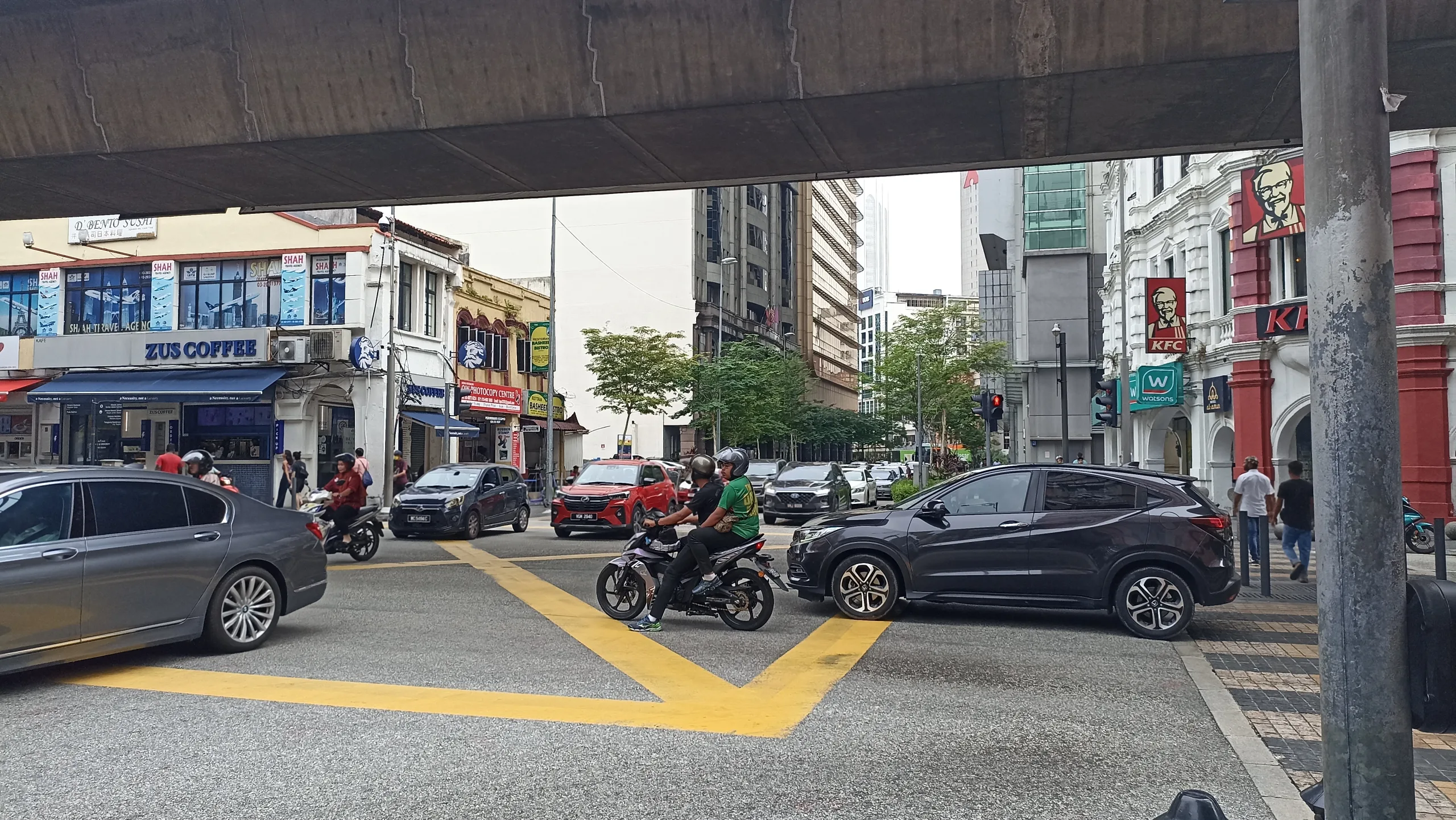 The intersection of Leboh Ampang and Jalan Tun Perak at Masjid Jamek, Kuala Lumpur, Malaysia. 